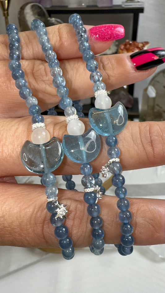 Aquamarine, Moonstone, and Topaz Moon w/ silver charms - claimed